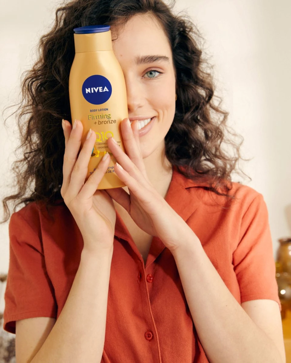 NIVEA Q10 Firming + Bronze Body Lotion - 400 Ml 8 NIVEA Q10 Firming + Bronze Body Lotion - 400 Ml - Afbeelding 8