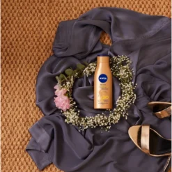 NIVEA Q10 Firming + Bronze Body Lotion - 400 Ml 12 NIVEA Q10 Firming + Bronze Body Lotion - 400 Ml -Zacht Huid Verkoop 964x1200 4