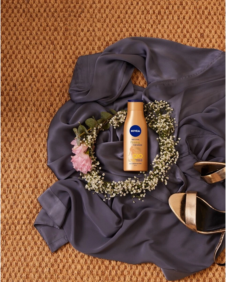 NIVEA Q10 Firming + Bronze Body Lotion - 400 Ml 5 NIVEA Q10 Firming + Bronze Body Lotion - 400 Ml - Afbeelding 5